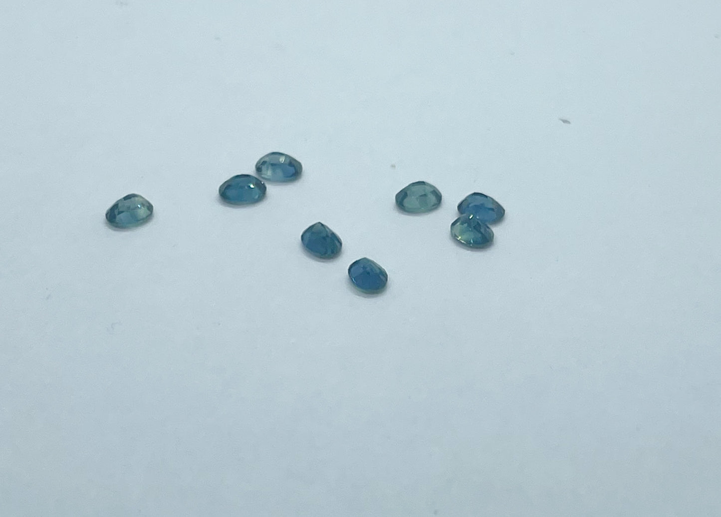 Blue and Parti Coloured Sapphires - Oval Cut Facet